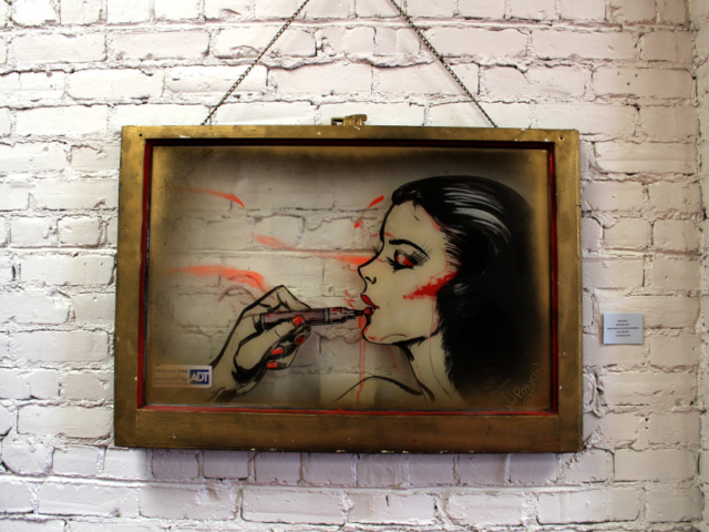 Vintage woman with oil marker lipgloss. Window painting with acrylic, spray paint, and resin.